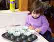 Breanna (34 months). She likes to help mum cooking!. Image is 65,144 bytes long and dated November 25 2001.